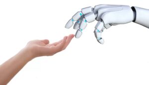 Immagine che mostra una mano robotica collaborativa che si avvicina a una mano umana, simbolizzando l'integrazione della robotica collaborativa nelle piccole e medie imprese. La robotica avanzata e collaborativa sta rivoluzionando l'automazione industriale migliorando la produttività.